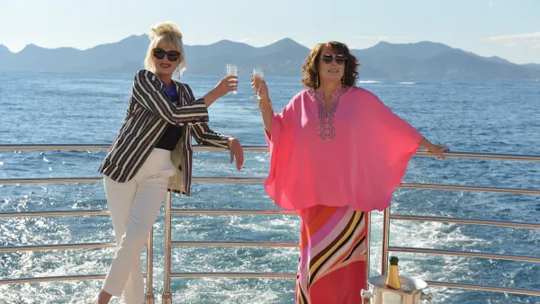 Two women drinking on a boat