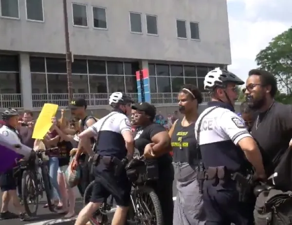 Police up in the face of black people in the street