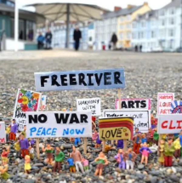 Bunch of peace and no war signs at the large outdoor area