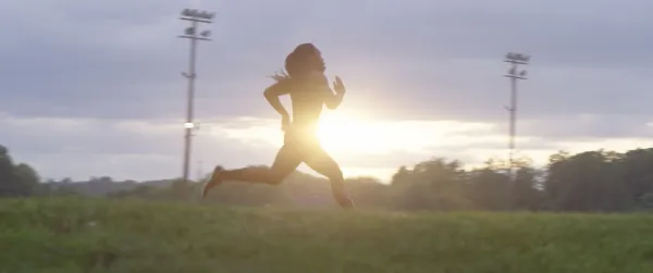 Silhouette of woman running