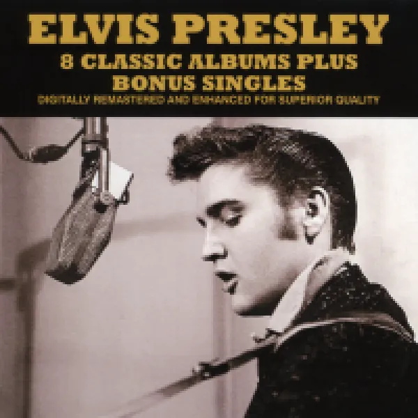 Young Elvis Presley singing into a mic
