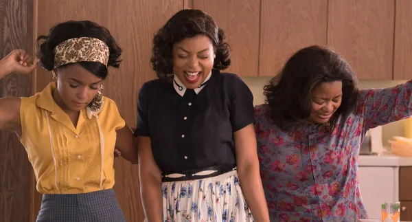 Black women in old fashioned clothes like they are celebrating