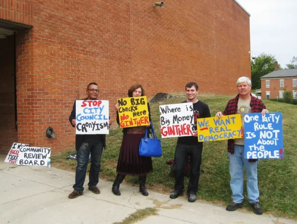 Protesters outside the October 1 public meeting asked: Where is Andrew Ginther? Protesters outside the October 1 public meeting asked: Where is Andrew Ginther?