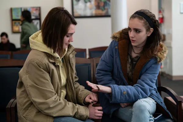 Two women in intense conversation