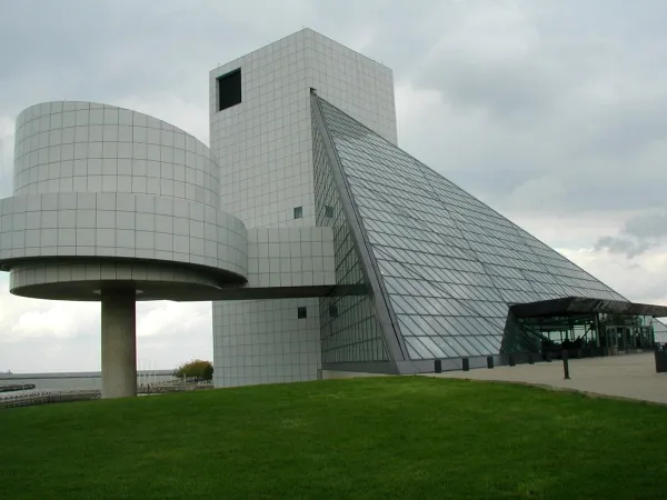 Big concrete structure with roundedness to the buildings and one big triangular side