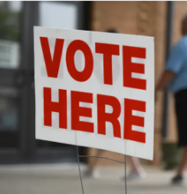 Vote here sign