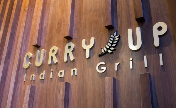 Curry Up sign