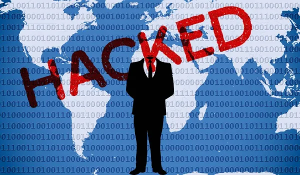 The world behind a guy who looks like Trump with the words HACKED