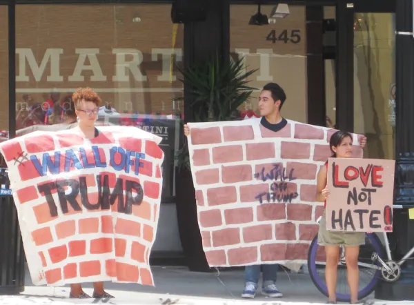 Protesters demontrate across the street from Donald Trump’s town hall at the Columbus Convention Center on August 1. Protesters demontrate across the street from Donald Trump’s town hall at the Columbus Convention Center on August 1.